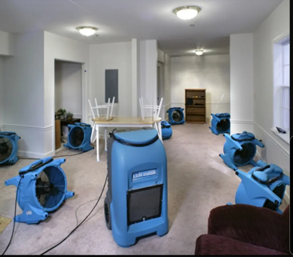 Air movers and dehumidifier setup for Water Extraction & Removal in Elba